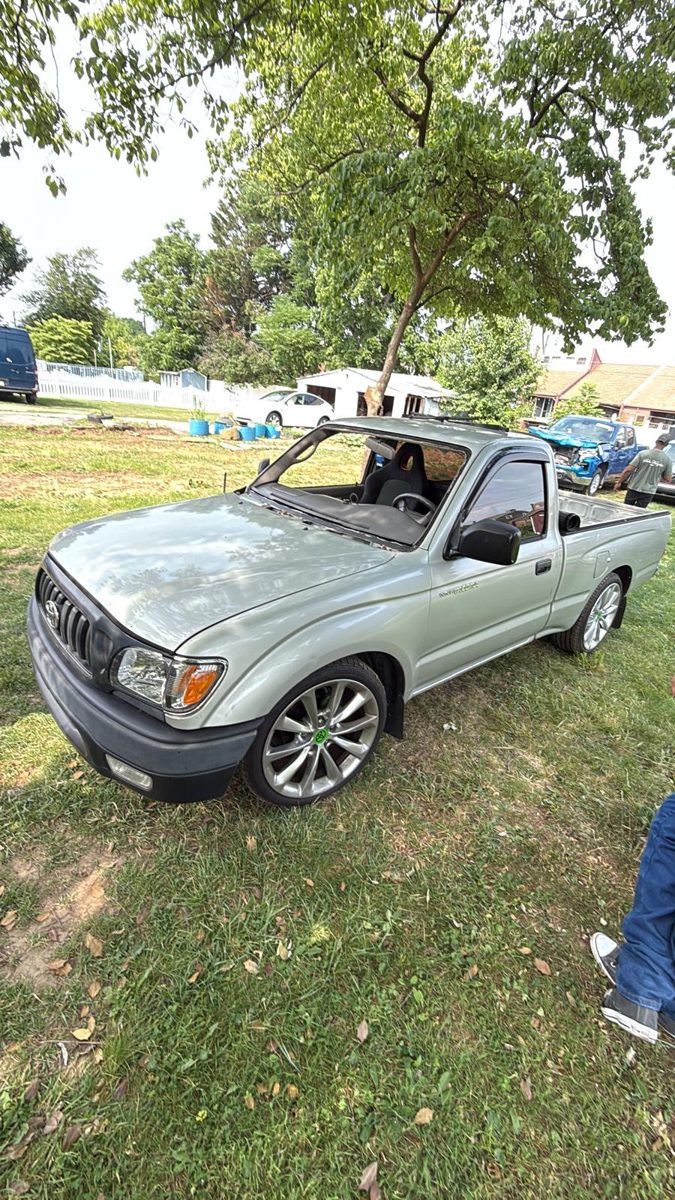 Toyota Tacoma with windshield removed, ready for new glass
