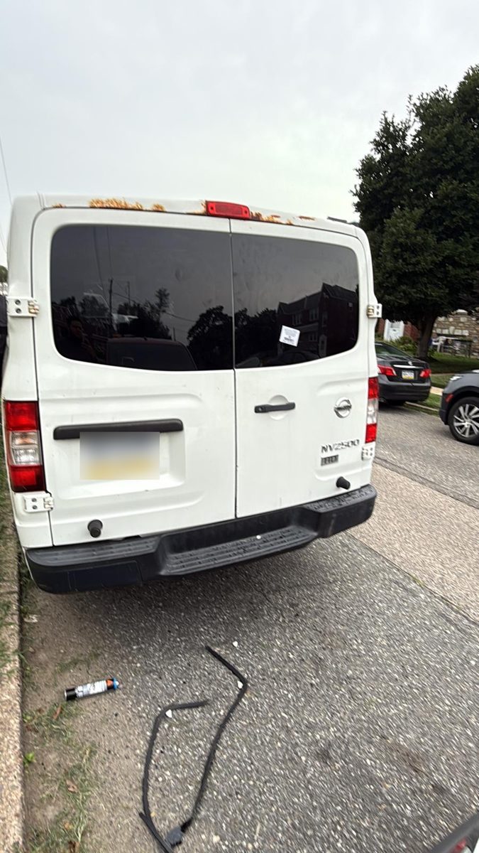 Nissan NV2500 van with replaced rear door glass